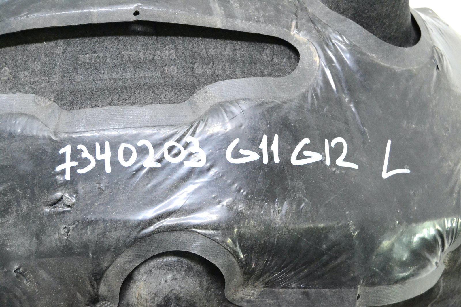 7340203 Підкрилок задній лівий bmw G11 G12